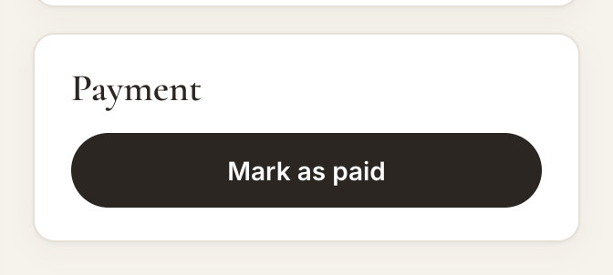 The Mark as paid button on an invoice